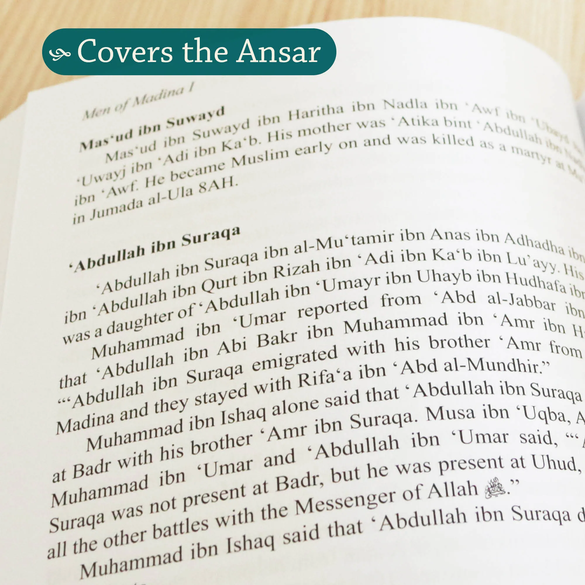 Page close up of The Men of Madina I by Muhammad Ibn Sa’d, Aisha Bewley. Kitab at-Tabaqat by Ta-Ha Publishers