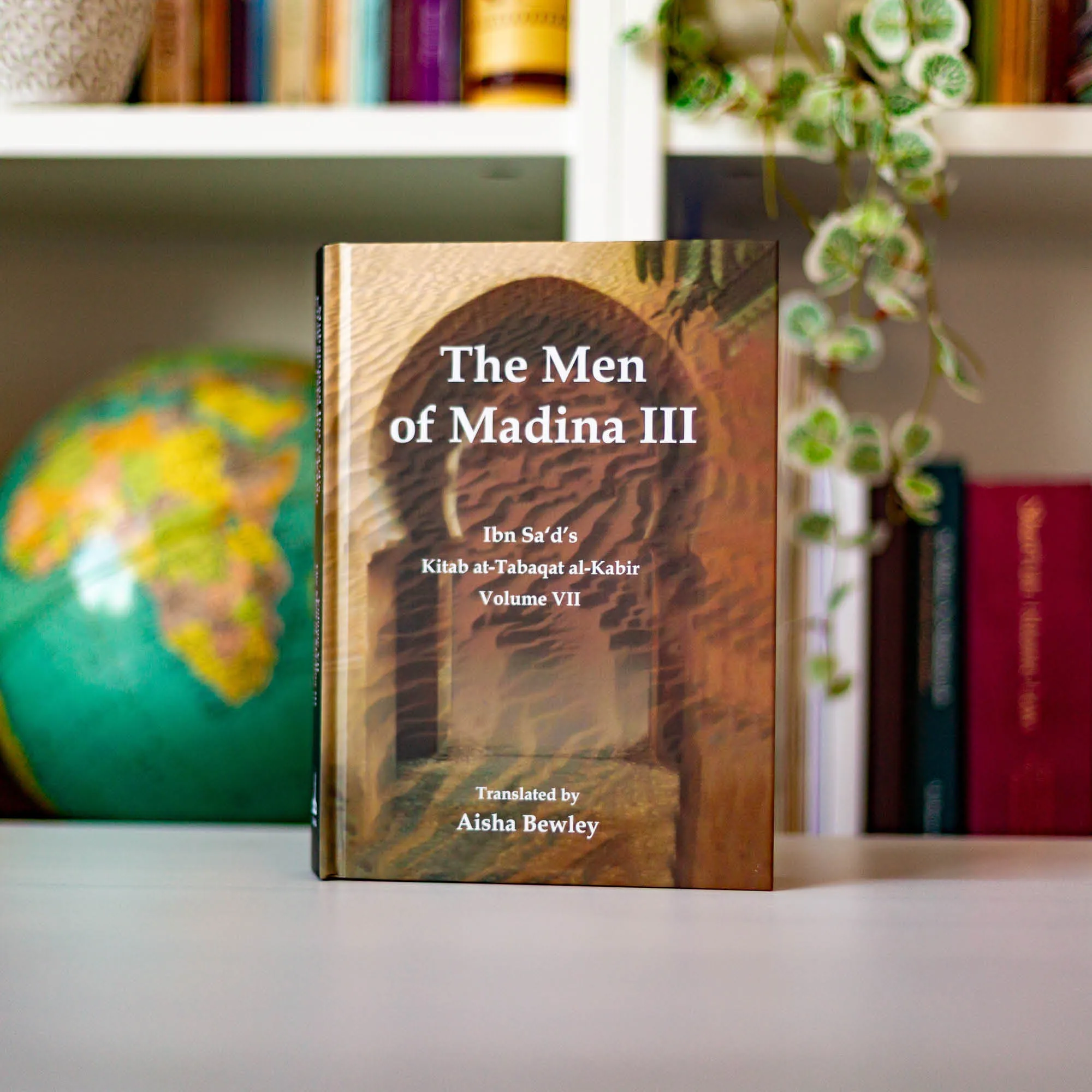 Upright book in library of The Men of Madina III by Muhammad Ibn Sa’d, Aisha Bewley. Kitab at-Tabaqat by Ta-Ha Publishers