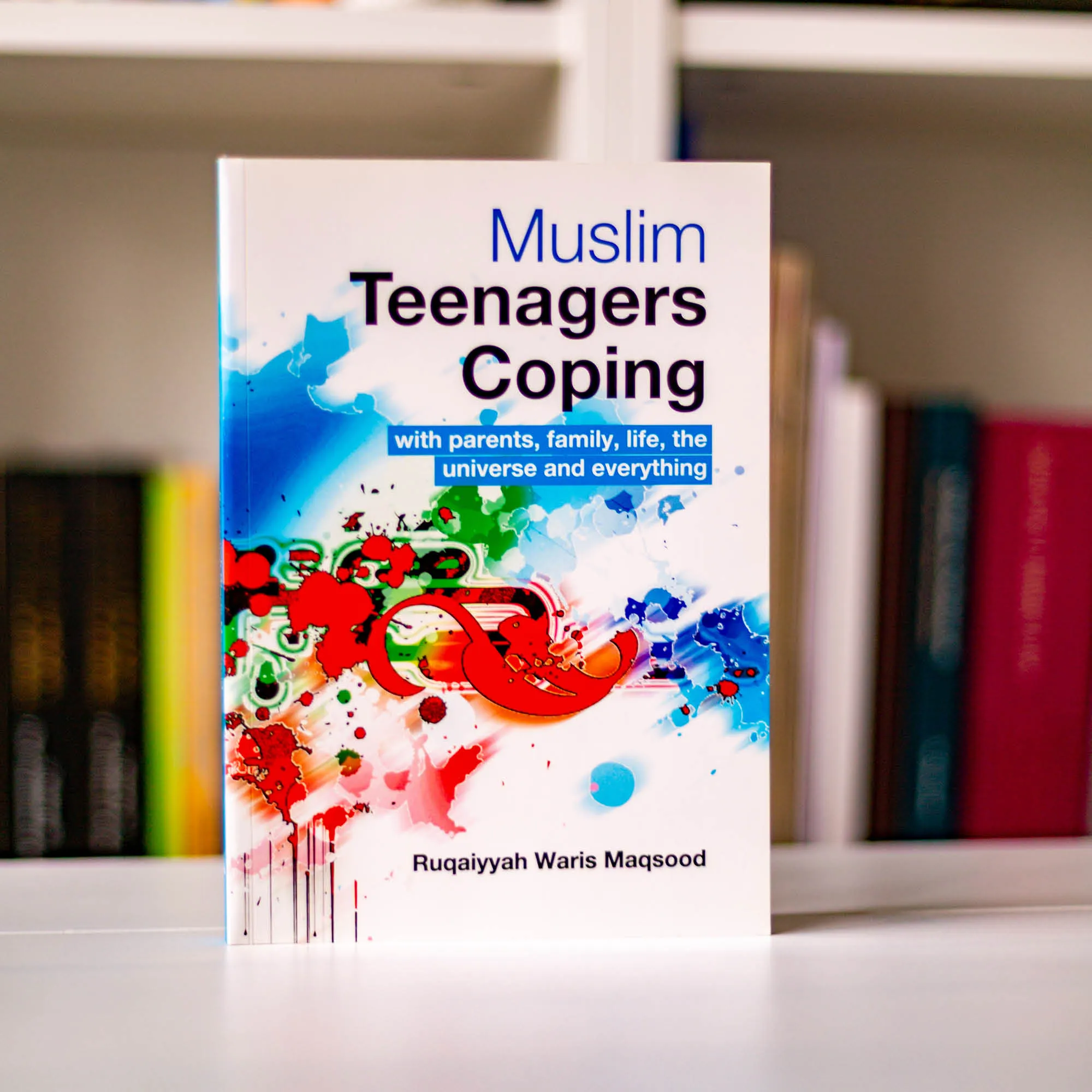 Upright book in library of Muslim Teenagers Copying by Ruqaiyyah Waris Maqsood. Muslim teen guide by Ta-Ha Publishers