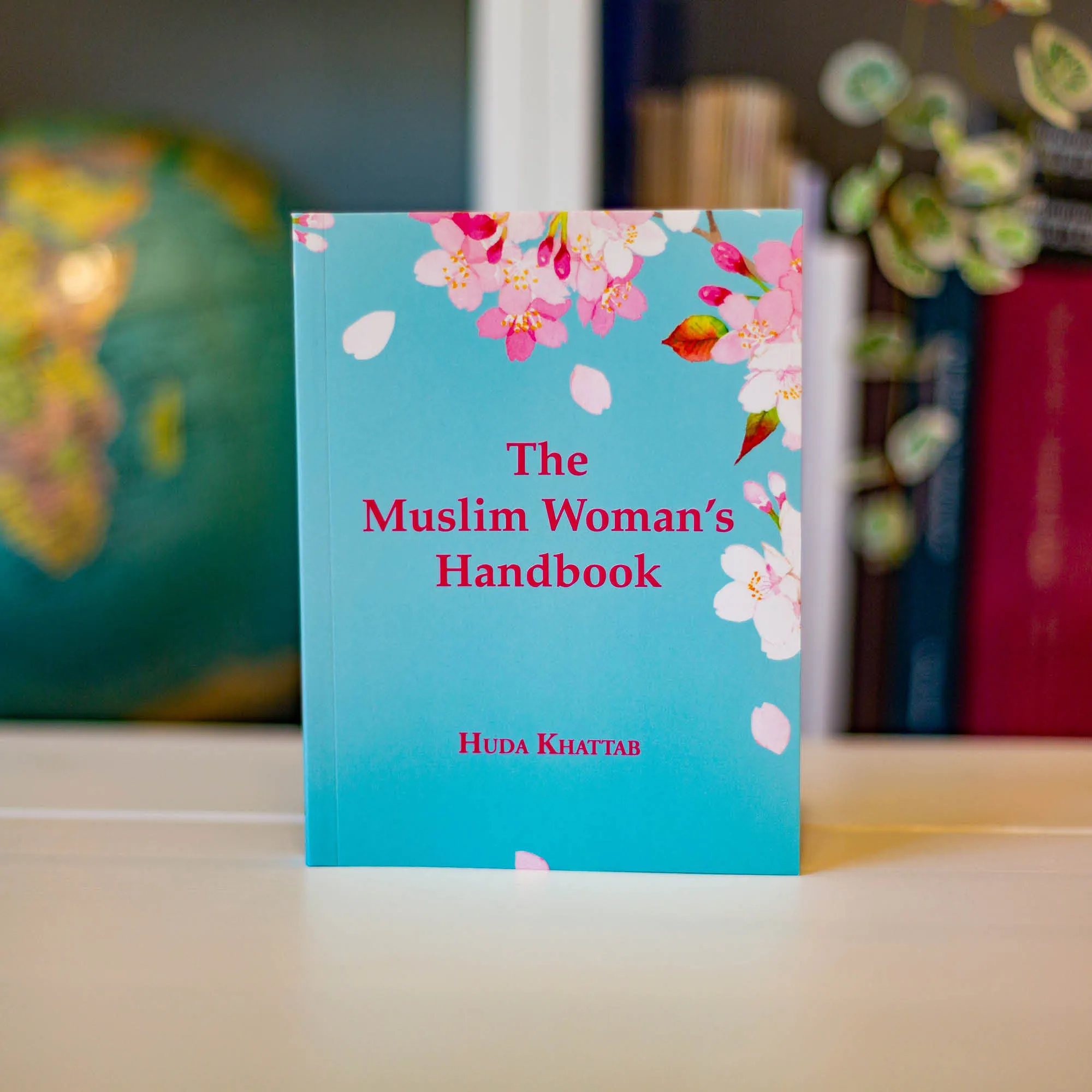 Upright book in library of The Muslim Woman’s Handbook by Huda Khattab. Muslim woman’s handbook by Ta-Ha Publishers