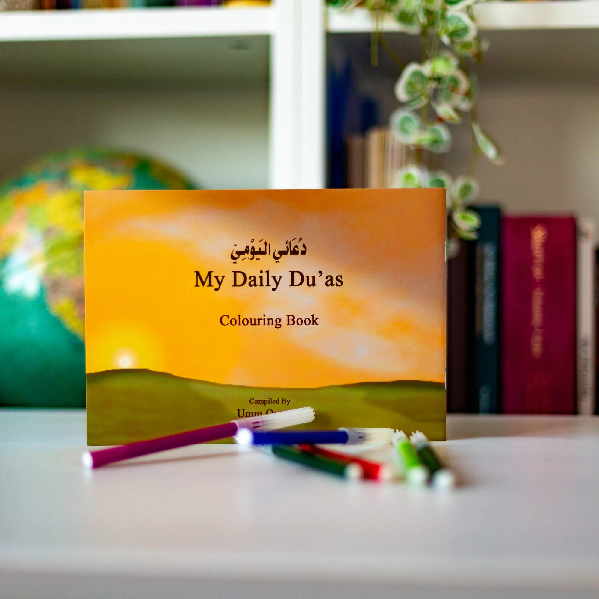 Upright book in library of My Daily Du’as by Umm Ousama. Children’s du’a colouring book by Ta-Ha Publishers