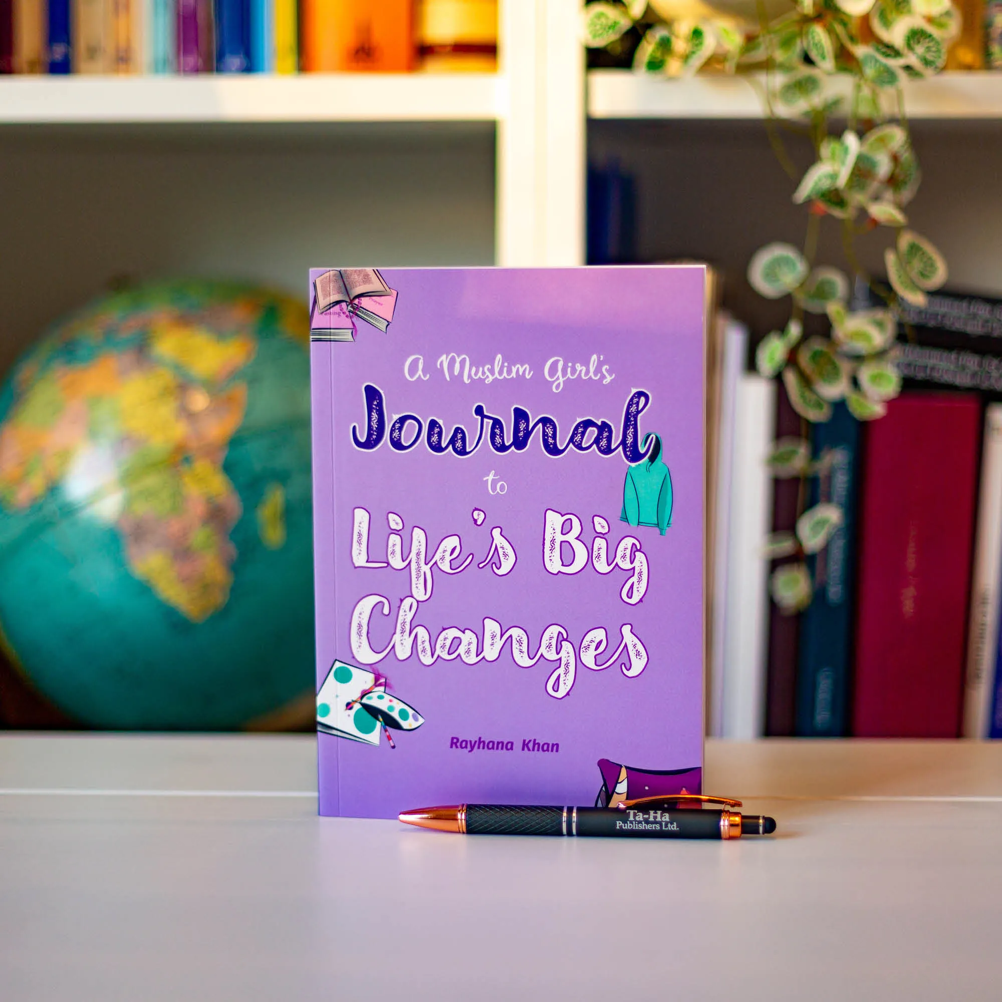 Upright book in library of A Muslim Girl’s Journal to Life’s Big Changes by Rayhana Khan. Pre-teen girls’ Islamic journal by Ta-Ha Publishers