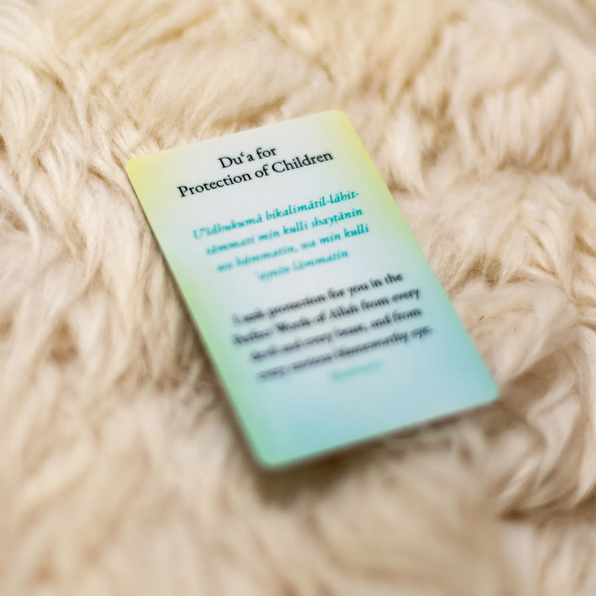 Back of Du'a for Protection of Children Card by Ta-Ha Publishers. Plastic wallet du'a card